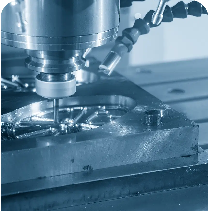 CNC machine milling a metal component.