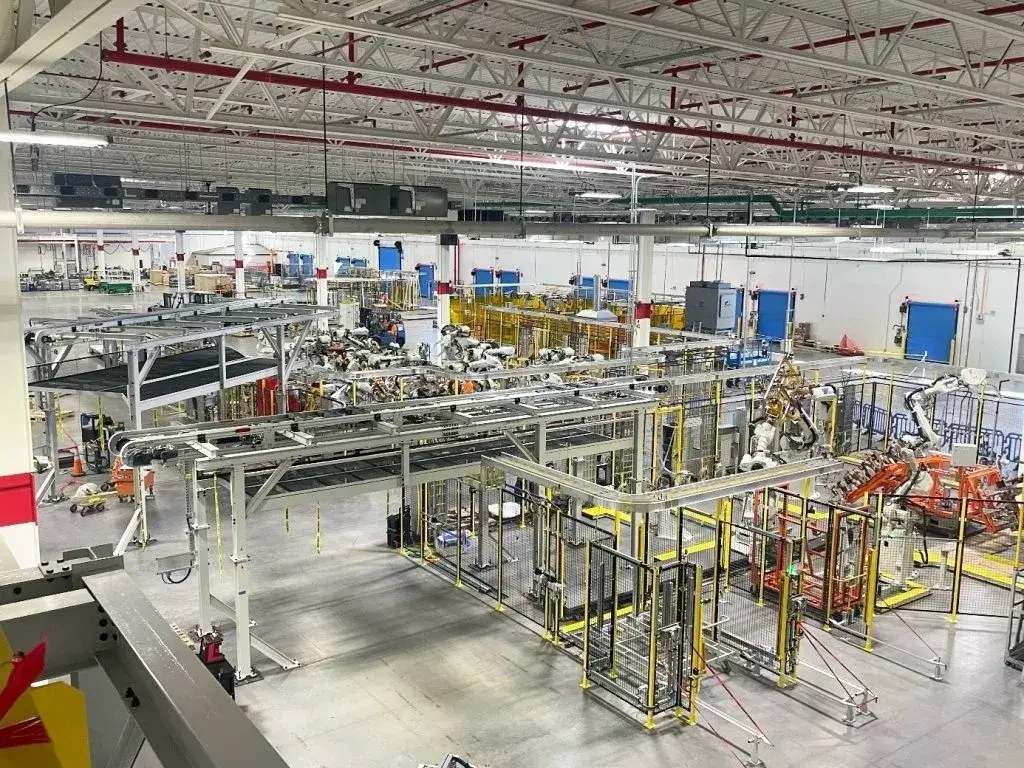 Industrial factory with machinery and equipment inside.